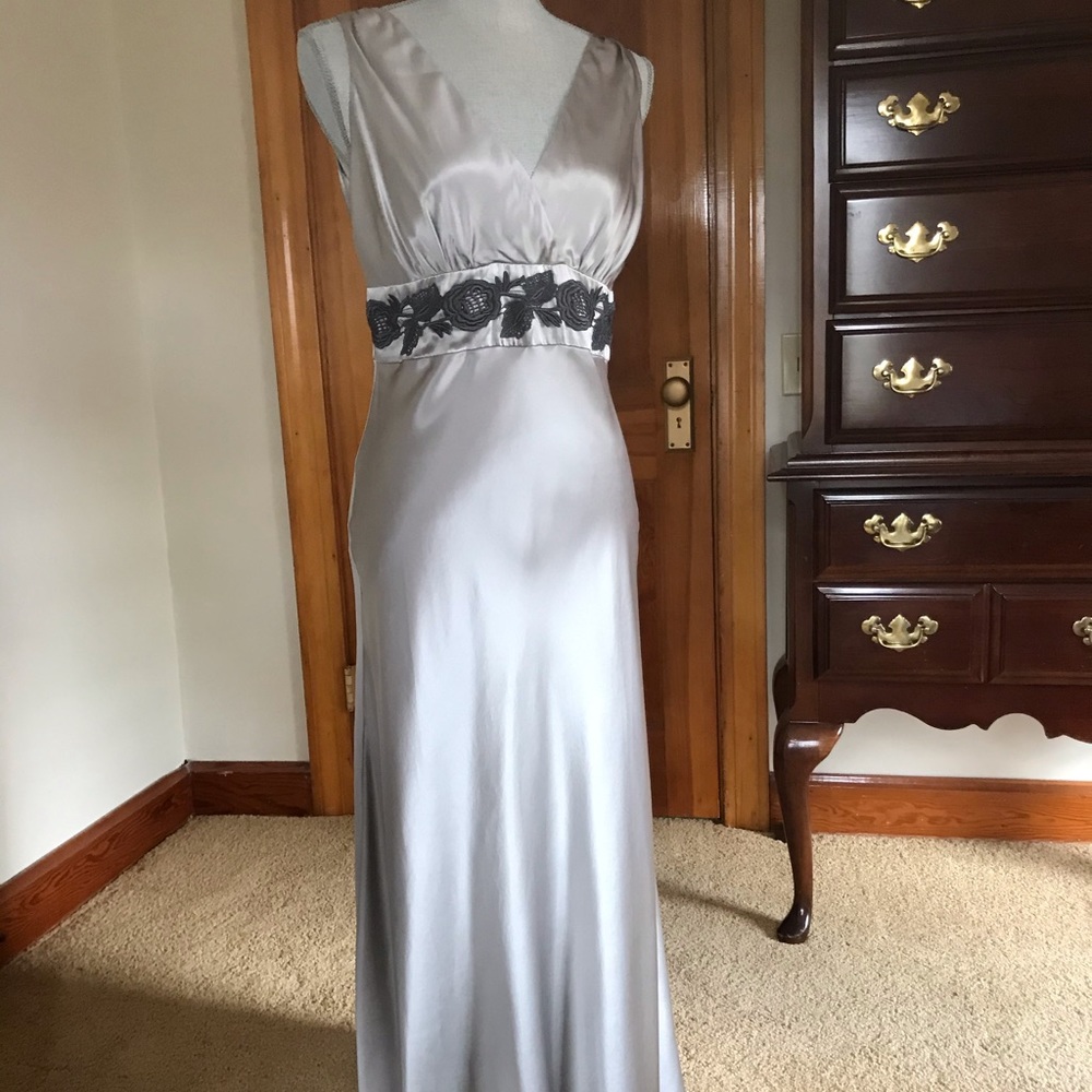 Long, silky, fancy gown.